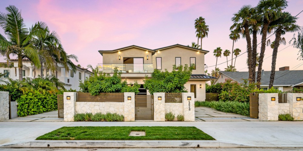 House with a beautiful garden and metal gates. California, USA